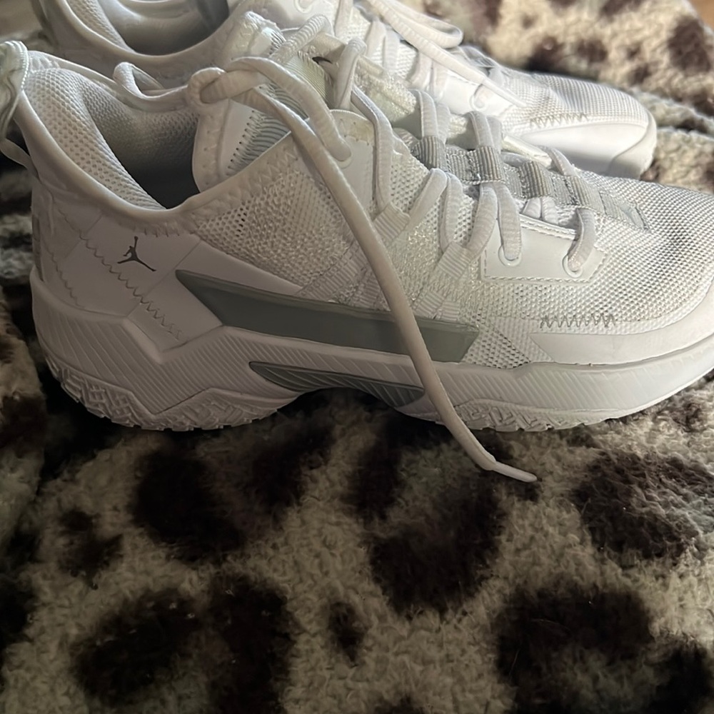 Youth size 4 Jordan’s basketball shoes. Worn for one basketball season.